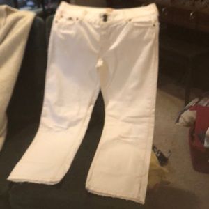 White denim capris.. destressed by knees ..Hollister brand .. .size 11R